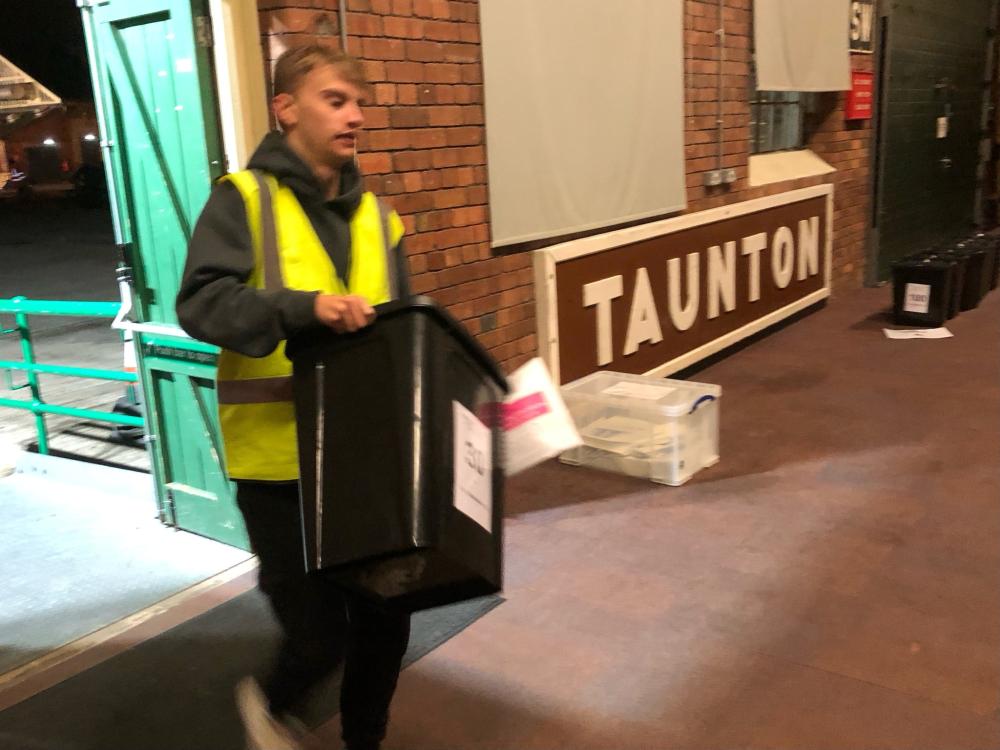 A ballot box is delivered to the count at Steam