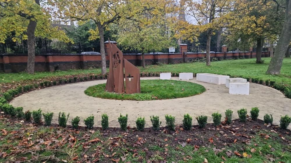 Images of the new circle of Euonymous Jean Hugues Trees around the WW1 memorial in GWR Park
