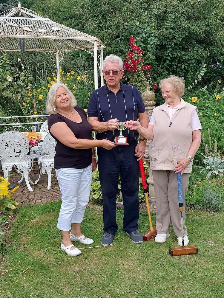 Sponsor Sue Roper (left) presenting the Elton Cup to Bill Marner and Di Trott