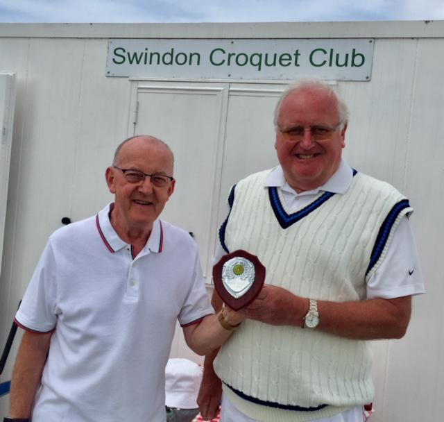 Victorious Team Captain Tony Tomlin, left, receiving the trophy from Chairman Clive Smith  