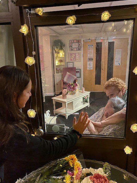 Lucy May meeting her 90-year-old mum Rosie in the new visiting area created at Fessey House in Haydon Wick