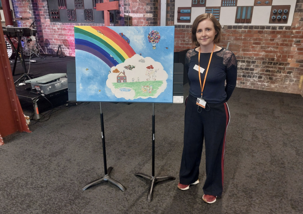 Cllr Kate Tomlinson, Swindon Borough Council's Cabinet Member for Children and Education, with rainbow artwork