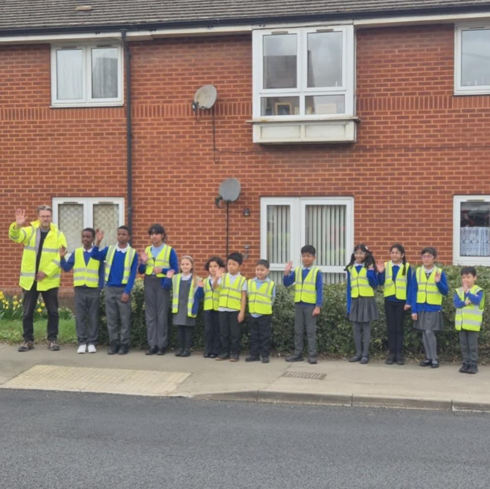 Councillor Chris Watts with children from Robert Le Kyng Primary School