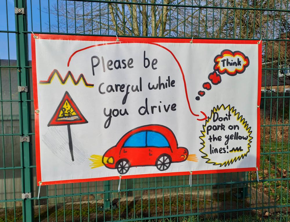 Pupils from Greenmeadow Primary have worked to design some road safety banners to decorate the school gates