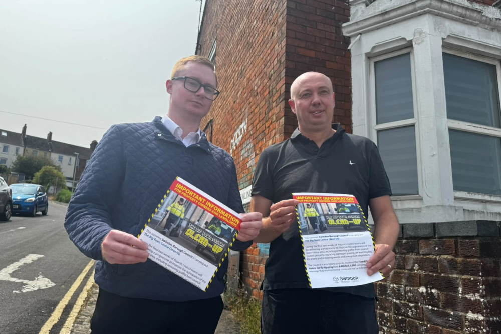 Cllr Vallender, left and Cllr Parry with a copy of the flyer