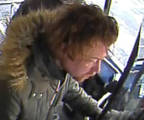 Police issue CCTV image after man hurls racial abuse aboard bus