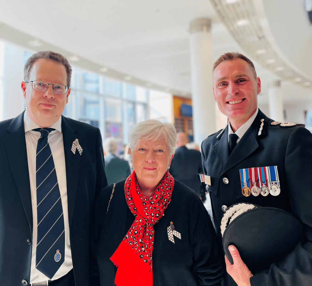 Yvonne Harding and son Tim (centre and left) with Chief Constable Kier Pritchard (right)