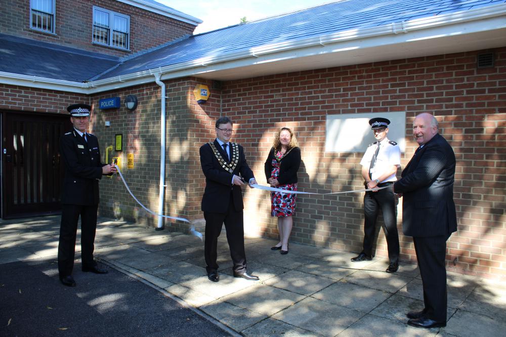 Royal Wootton Bassett Mayor and Mayoress Nic and Sue Hughes cut the ceremonial ribbon watched by Police and Crime Commissioner Angus Macpherson, right, Chief Constable Kier Pritchard, left, and Inspector Doug Downing